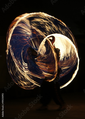 Magic fireshow made by man in medieval costume