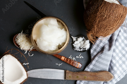 Top down view of Coconut oil, coconut flakes