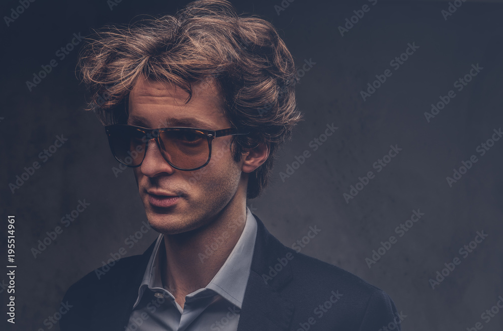 Studio portrait of a charismatic sensual macho with stylish hair Studio portrait of a charismatic sensual macho with stylish hair