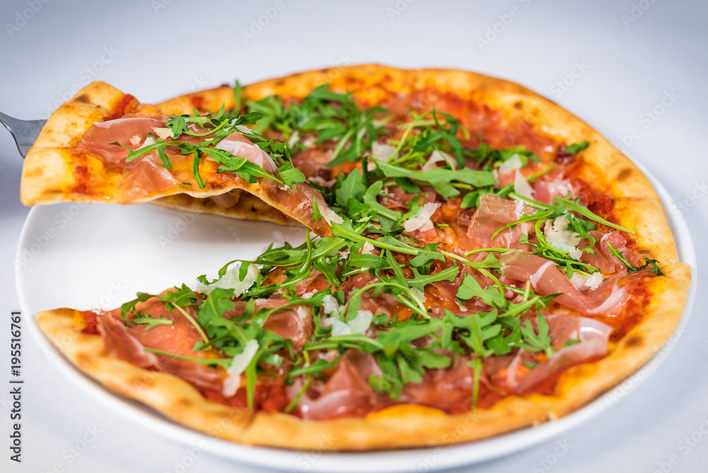 Pizza. Tasty fresh Italian pizza served on the plate Pizza. Tasty fresh Italian pizza served on the plate