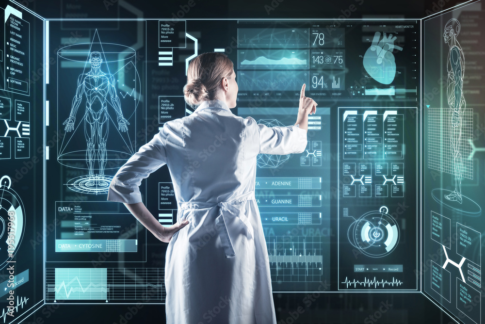 Medical innovation. Calm smart enthusiastic doctor using amazing