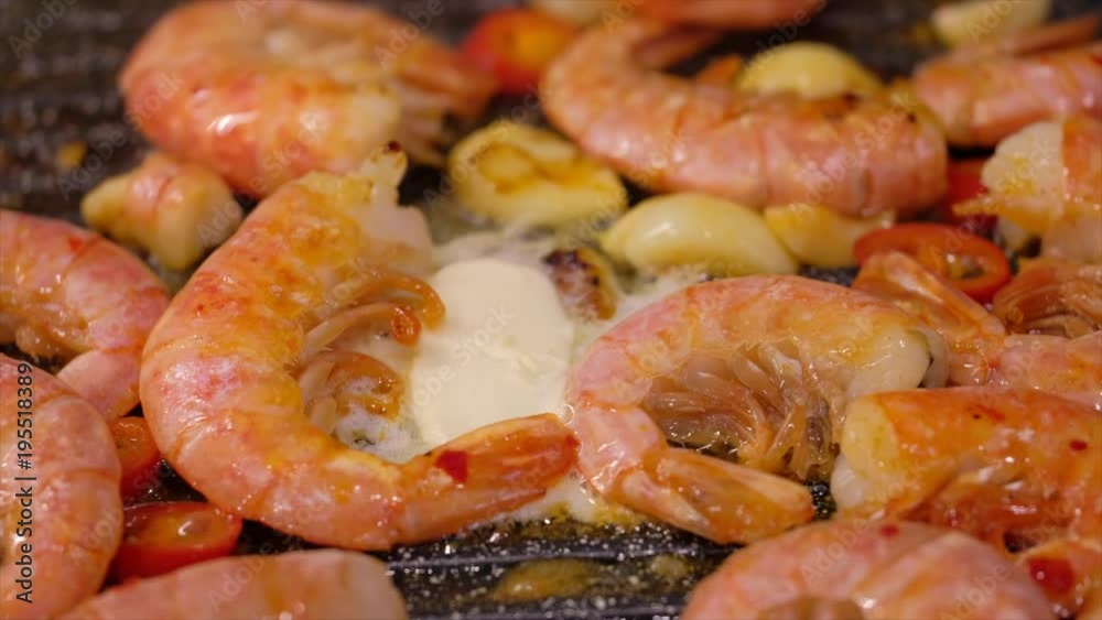 Fresh prawns with chilli and garlic on the grill Fresh prawns with chilli and garlic on the grill