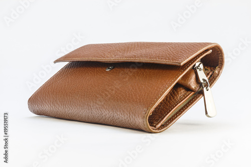 Brown female purse on a white backgroundBrown female purse on a white background photo