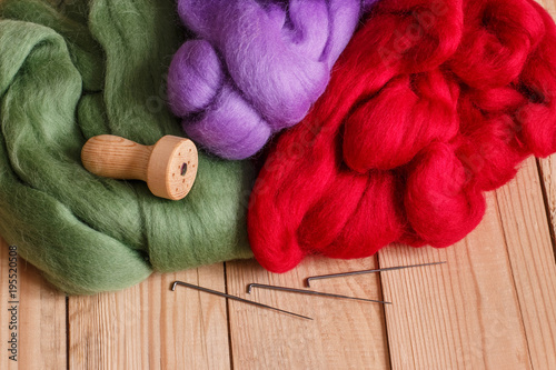 the art materials: colored wool for dry and wet felting and needle