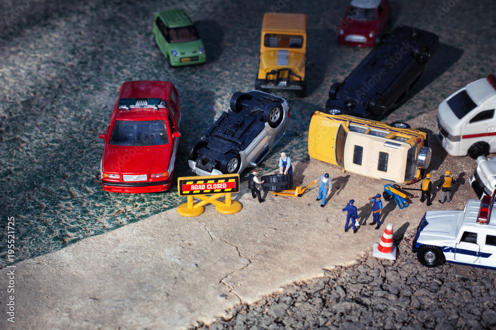 Scene of cars (miniature, toy model ) accident on street.Insurance / terrorism concept.