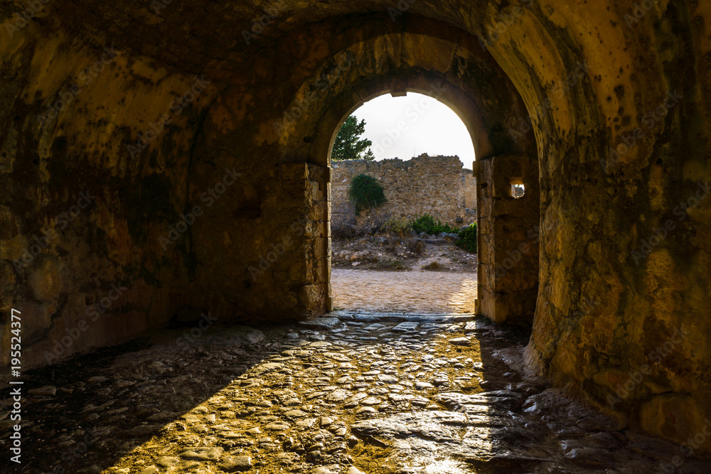 Fototapeta premium Castle gate of castle in Assos village of Cephalonia island in Greece. Is one of the largest castles in Greece and its construction, in late-16th century, was an ambitious project by the Venetians