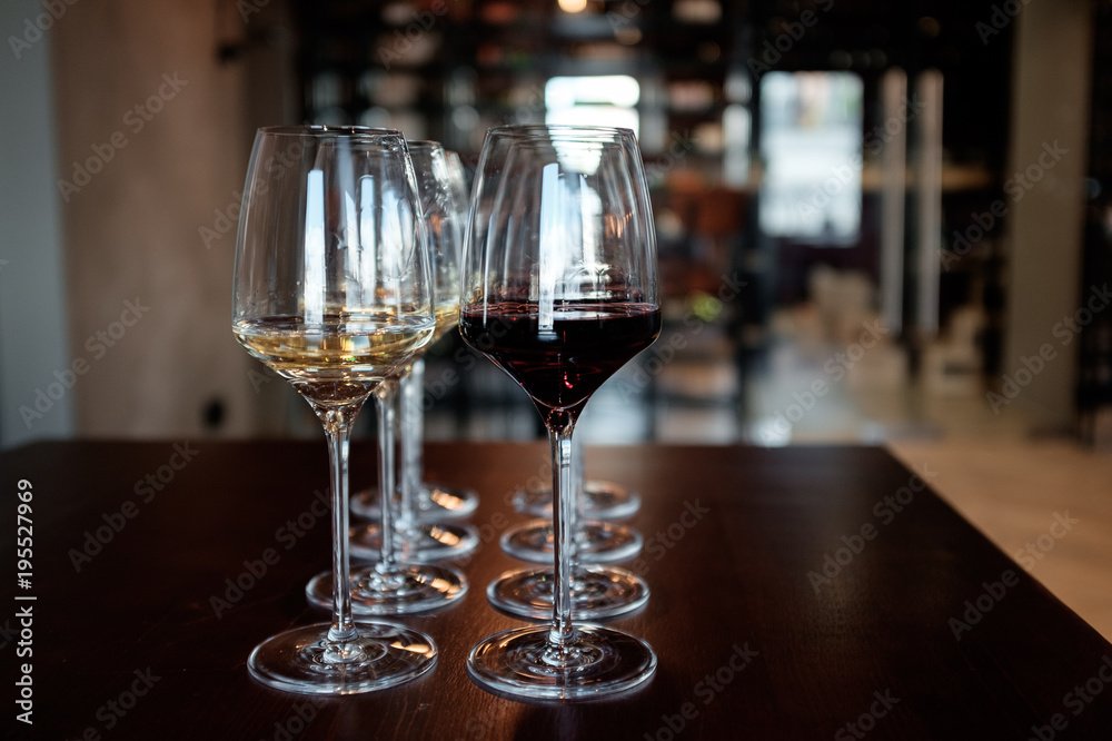 Glasses of white and red wine Glasses of white and red wine
