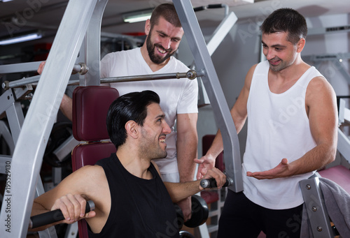 Three men in gym