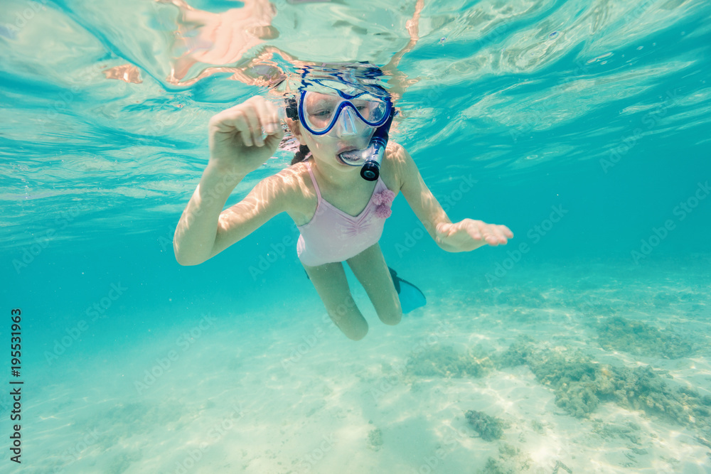 Little girl snorkeling