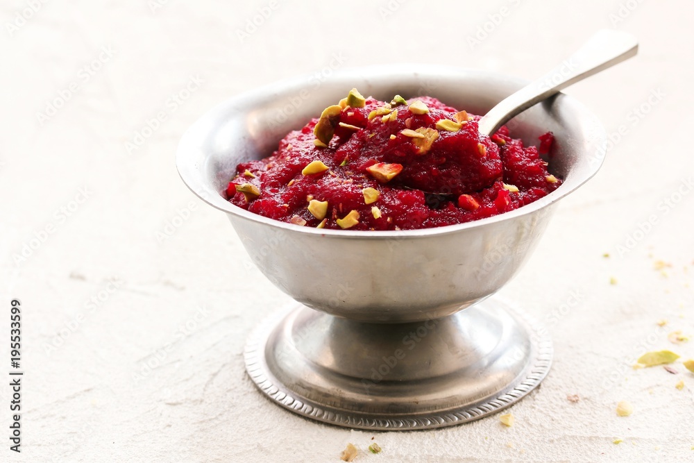 Homemade Beetroot Halwa with Pistachio garnish, selective focus Homemade Beetroot Halwa with Pistachio garnish, selective focus