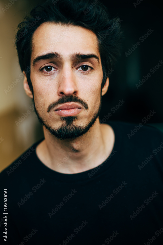 Fototapeta premium Sad and depressed Mediterranean looking young man