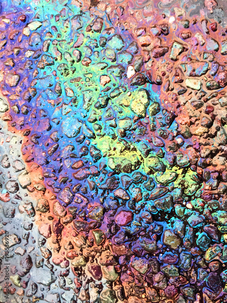 Obraz premium Oil Petrol Rainbow Leak on Pavement