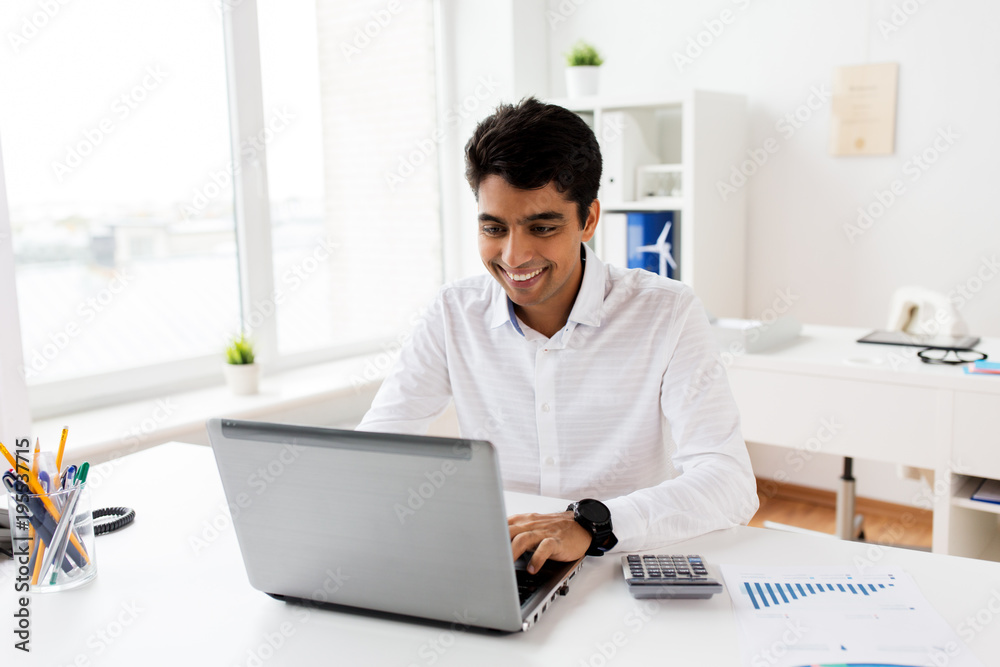 businessman with laptop and papers at office businessman with laptop and papers at office