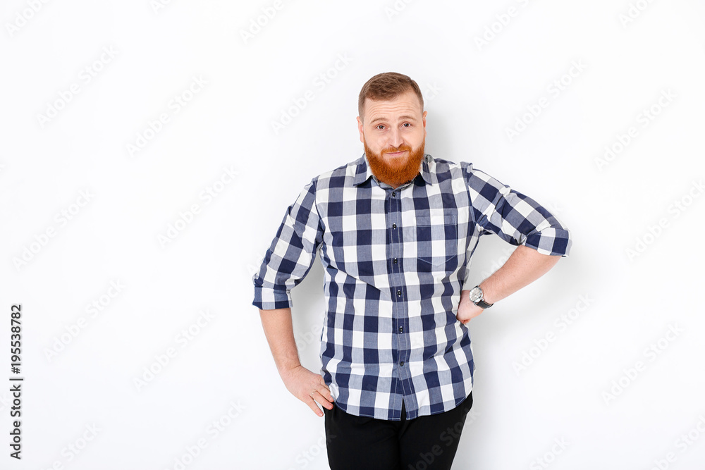 man with red hair and beard in plaid shirt man with red hair and beard in plaid shirt