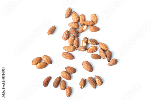 A lot of almond grains on a white background.