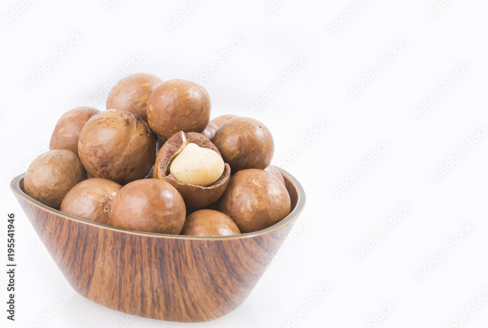 Macadamia nuts in the bowl - Macadamia integrifolia Macadamia nuts in the bowl - Macadamia integrifolia