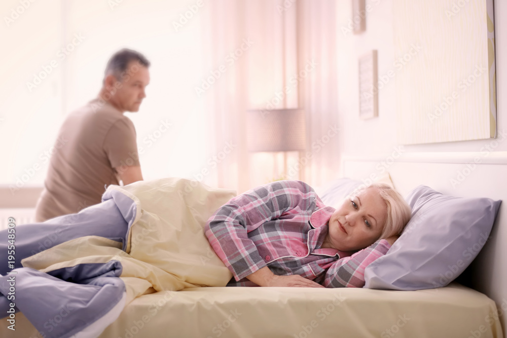 Senior couple with problem in relationship on bed Senior couple with problem in relationship on bed