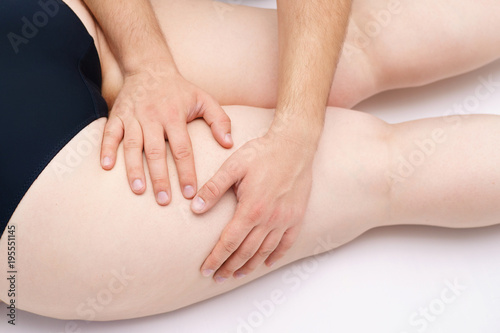Anti-cellulite massage for young woman, smooth and healthy skin, cosmetology clinic,beauty salon, spa, wellness, health care concept