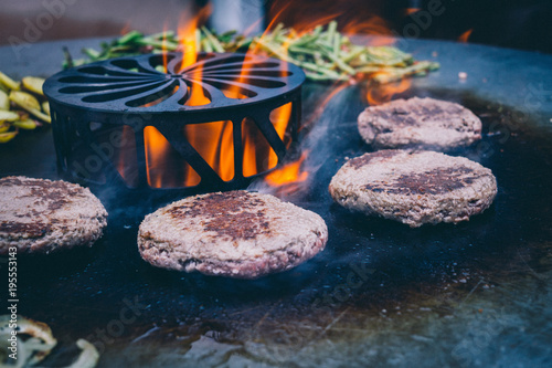 Feuerplatte grilled smoked BBQ Burger & Steak photo