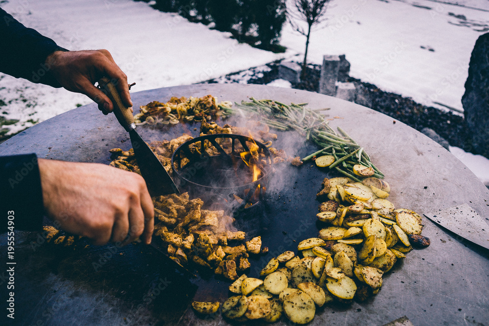 Feuerplatte grilled smoked BBQ Burger & Steak Fireplate Plancha Stock Photo  | Adobe Stock