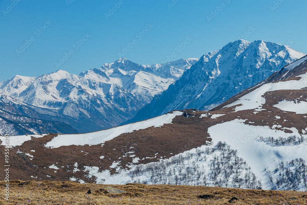 Mountain landscape. Caucasian mountain ridge with snow caps, Arkhyz, Russia