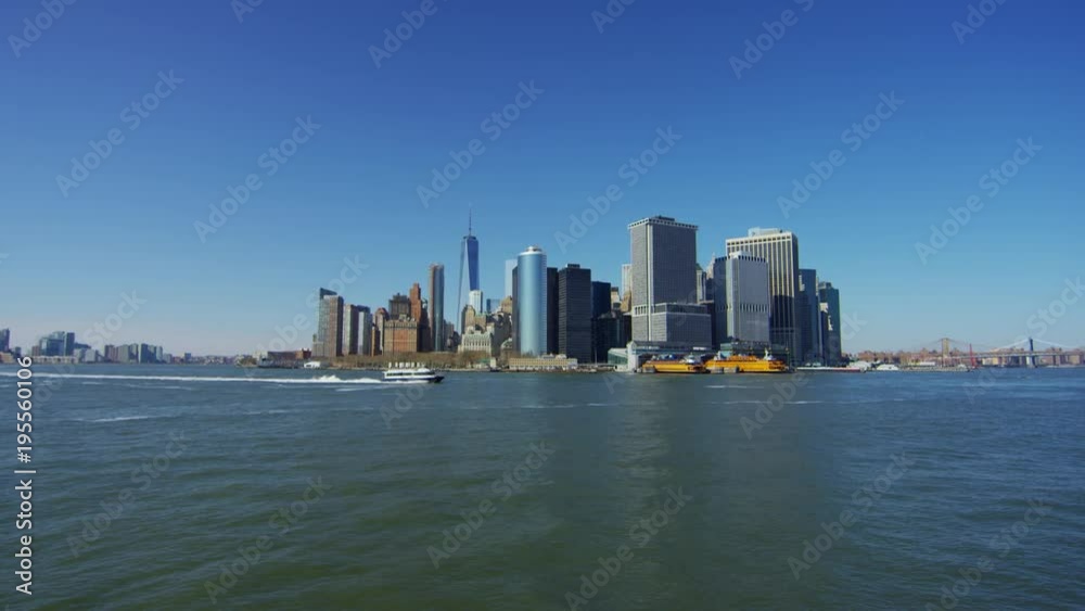 Boat sailing by Lower Manhattan, New York City Boat sailing by Lower Manhattan, New York City