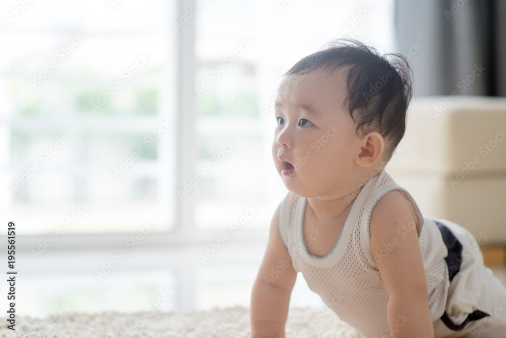 Baby crawling on carpet. Baby crawling on carpet.