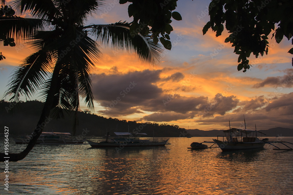 Sunset of Nacpan beach. The island of Palawan. Philippines.