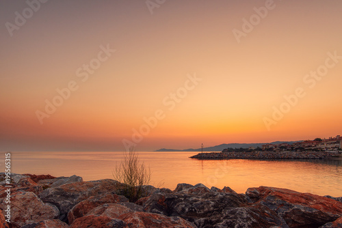 Sunset over the sea. Beautifull sunset over the Aegean sea, Peninsula Kassandra, Halkidiki, Greece.  © Vlajko611