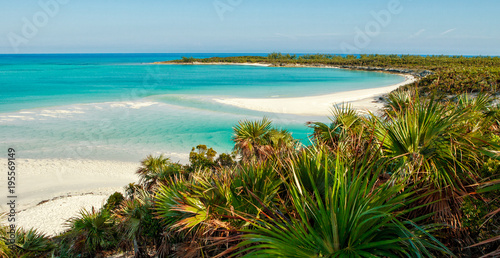 A view down the perfect, isolated beach on Shroud Cay in the Exumas, Bahamas. © Daniel