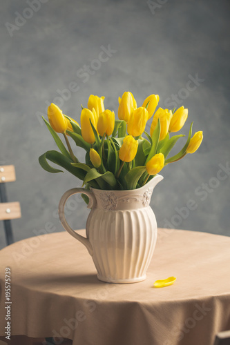 Yellow tulips in a jug