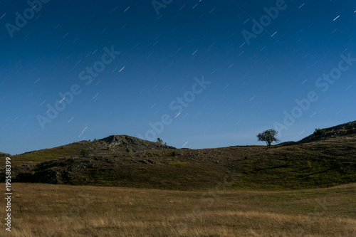 Nocuturnal moonlit landscape at Durmitor national park photo