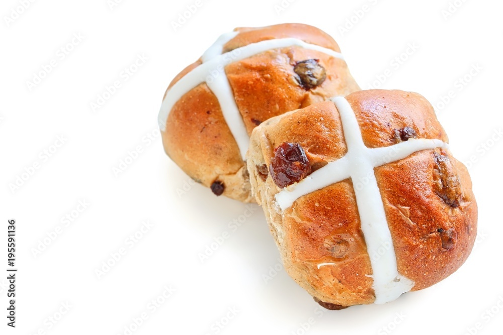 Freshly Baked Hot Cross Bun on White Background