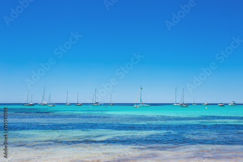 Es Trenc - amazing beach with beautiful clear water and lots of yachts, Mallorca Island, Spain