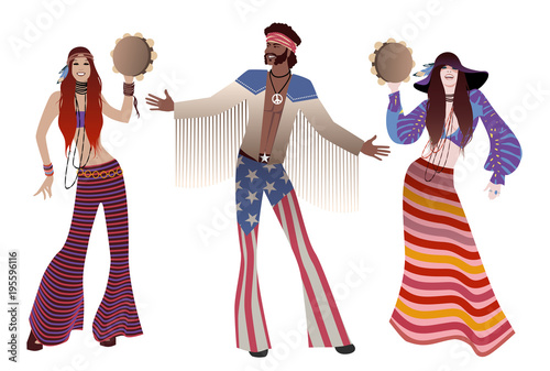Fotografie Group of three, two girls playing tambourines and a boy wearing hippie clothes o
