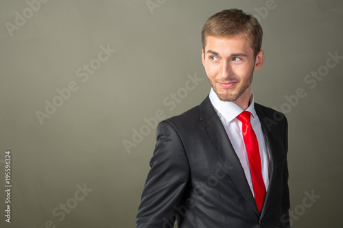 Young Businessman looking over his shoulder