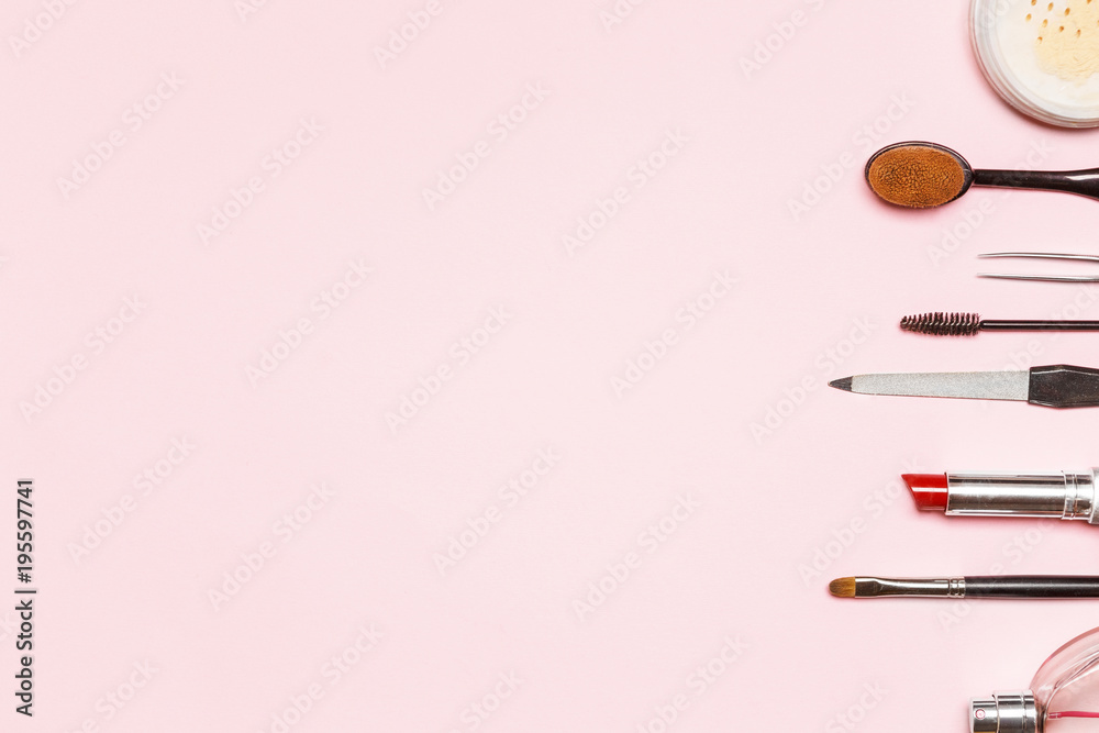 lay flat with various cosmetics on a blue background. A lot of free space for your text. the picture on the price for the makeup artist or beauty salon lay flat with various cosmetics on a blue background. A lot of free space for your text. the picture on the price for the makeup artist or beauty salon