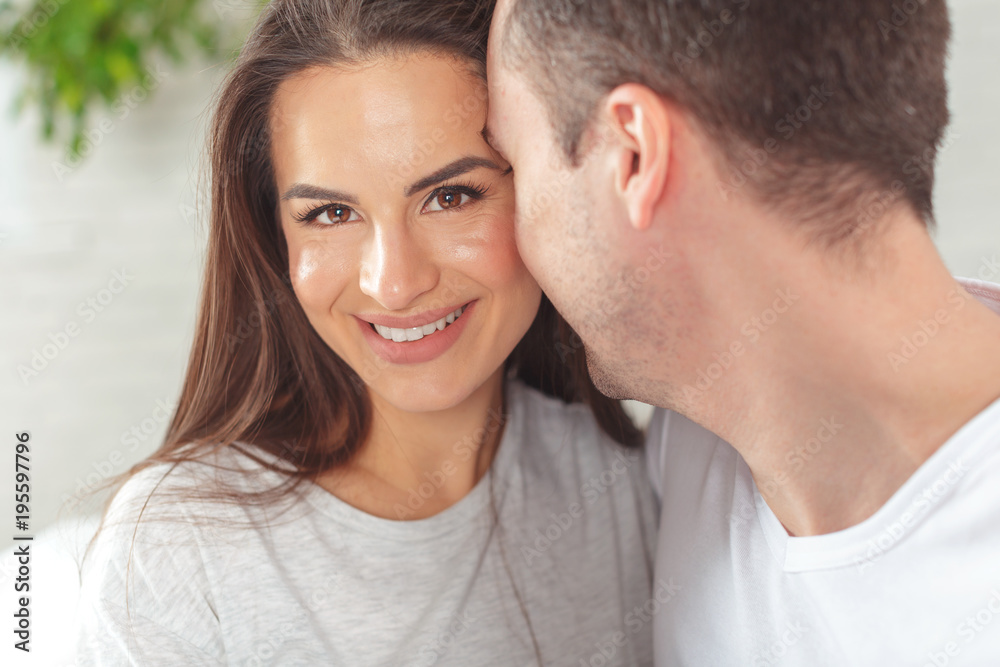 Cheerful young couple in the morning at home Cheerful young couple in the morning at home