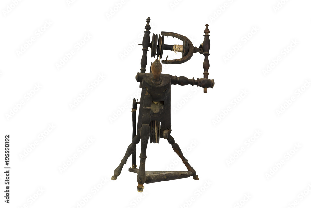 Spinning Wheel For Making Yarn From Wool Fibers. Vintage Rustic Equipment Spinning Wheel For Making Yarn From Wool Fibers. Vintage Rustic Equipment