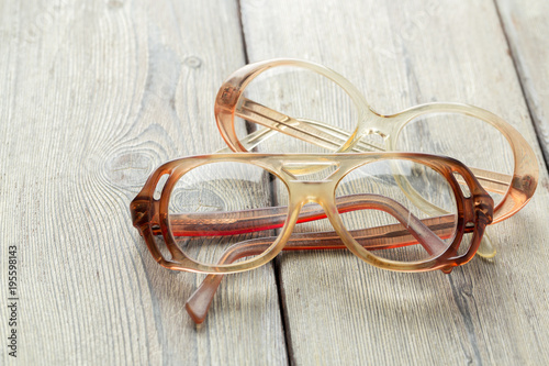 eyeglasses on wooden table