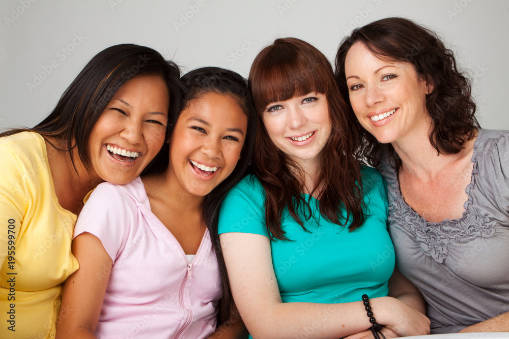 Diverse group of mothers and daughters. Diverse group of mothers and daughters.
