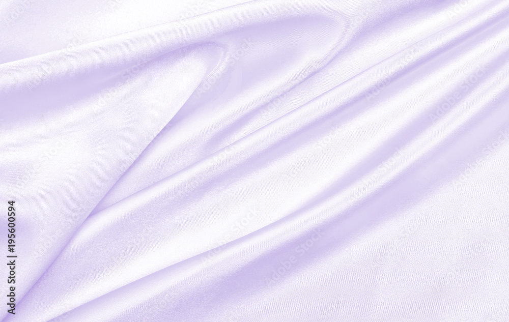Obraz premium Smooth elegant lilac silk or satin texture as wedding background. Luxurious valentine day background design