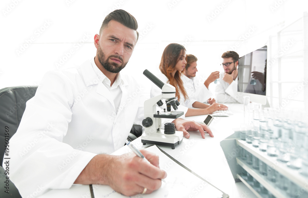 young scientist works in the lab. young scientist works in the lab.