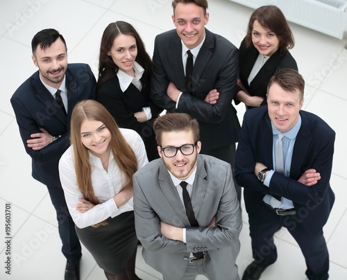 group of young business people looking up