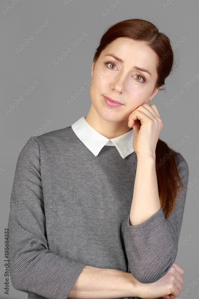 Beautiful Business Woman on grey background Beautiful Business Woman on grey background
