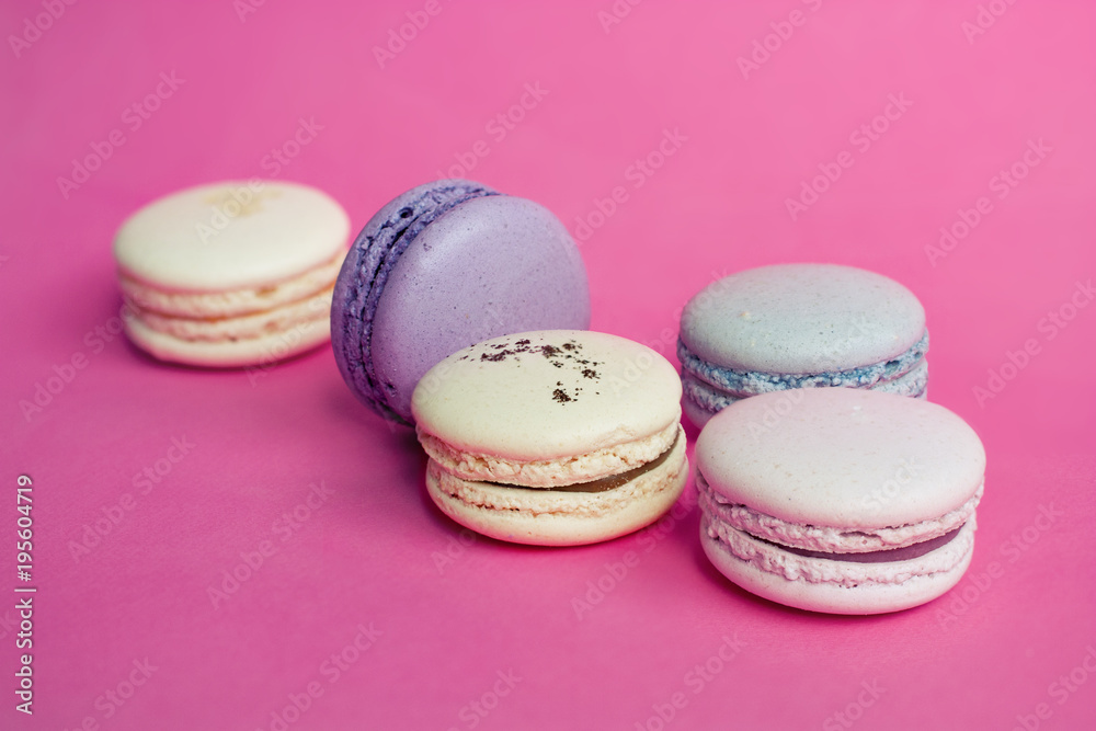 Colorful Macaroon in close up on pink background