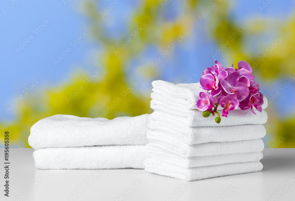 Stack of folded white spa towels Stack of folded white spa towels