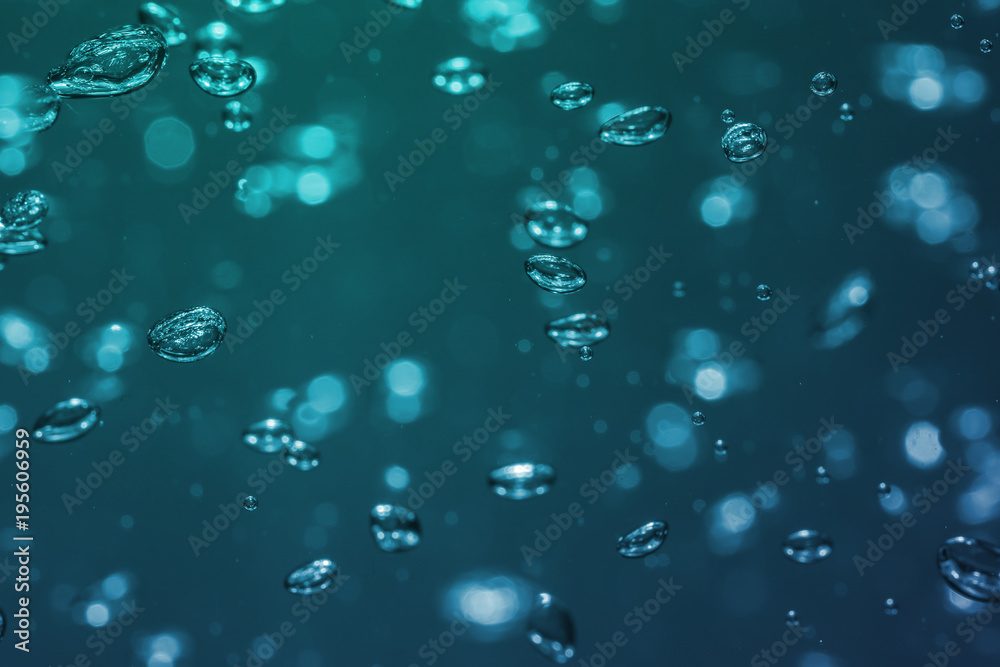 bubbles of different color in the water bright high lights