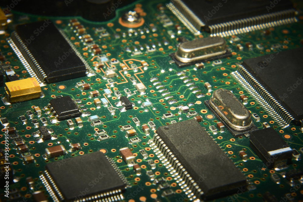 Electronic computer circuit board close up.
Electronic computer circuit board close up.