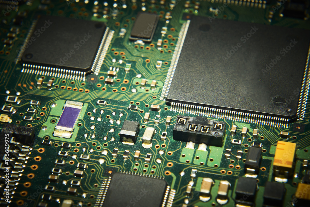 Electronic computer circuit board close up.
Electronic computer circuit board close up.